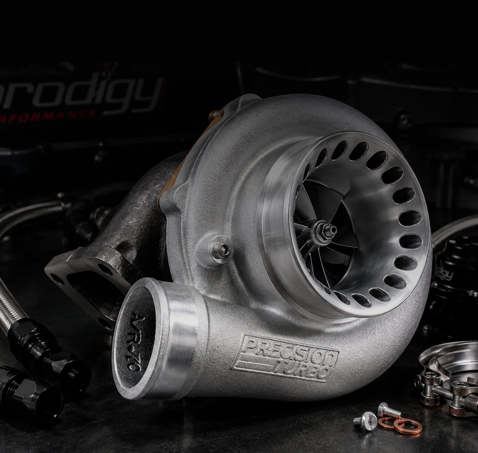 Turbocharger with 'Precision Turbo' branding on a dark background